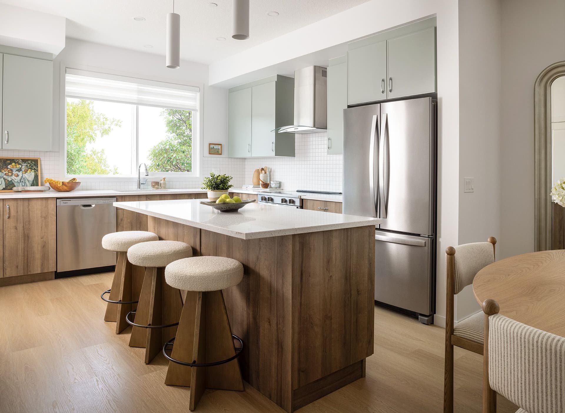 Barwell kitchen with pale green cabinets.